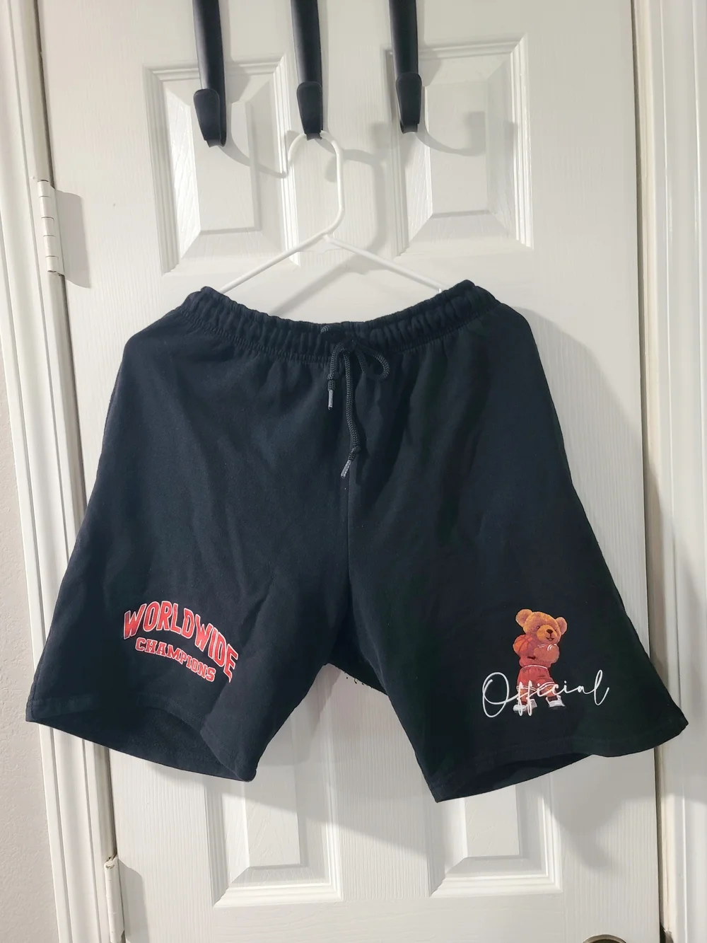 Black Athletic Drawstring Shorts with Teddy Patch and Red Accent